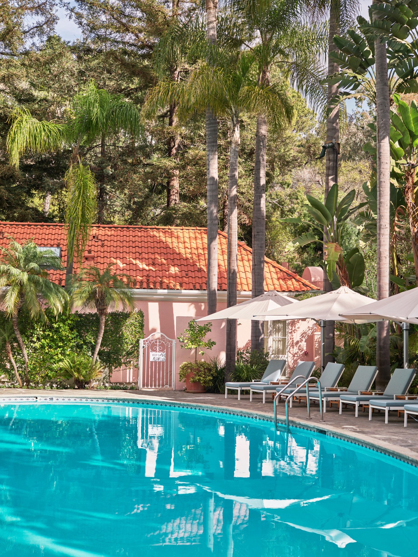 Pool with lounge chairs at Hotel Bel-Air