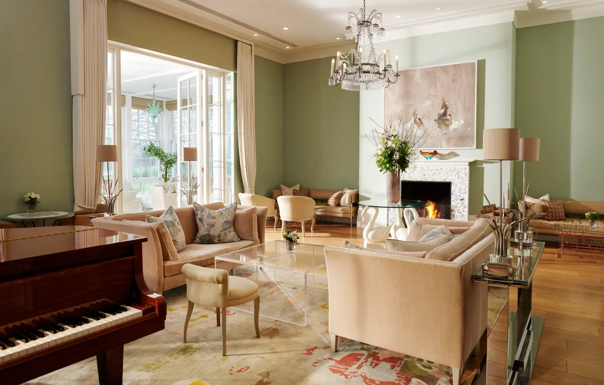 Coworth Park Drawing Room wide view of the drawing room towards the piano