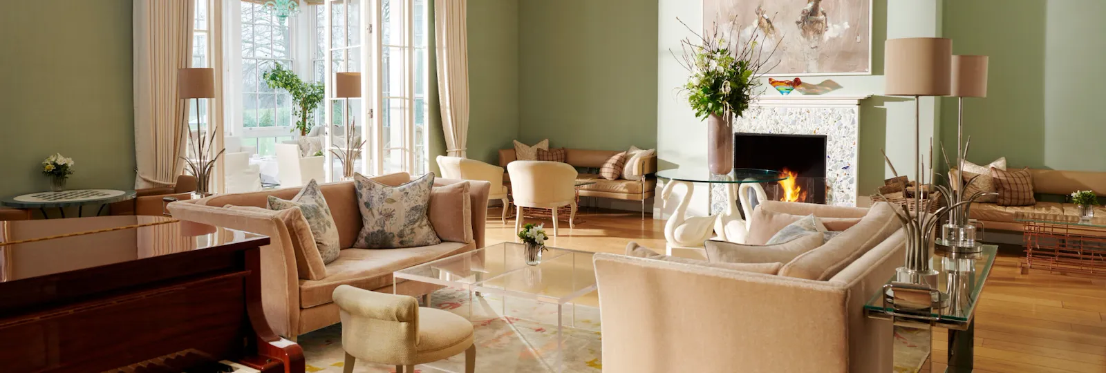 Coworth Park Drawing Room wide view of the drawing room towards the piano