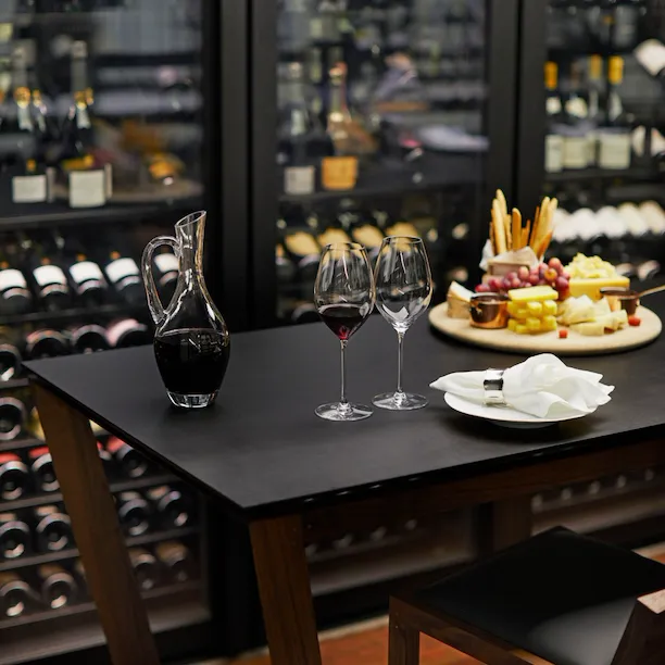 Wine and cheese board on table in the Wine Vault