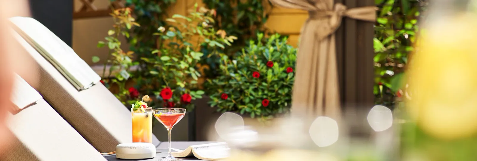 Sunbeds and two cocktails at sunny Aurora Terrace Suite at Hotel Eden, Rome