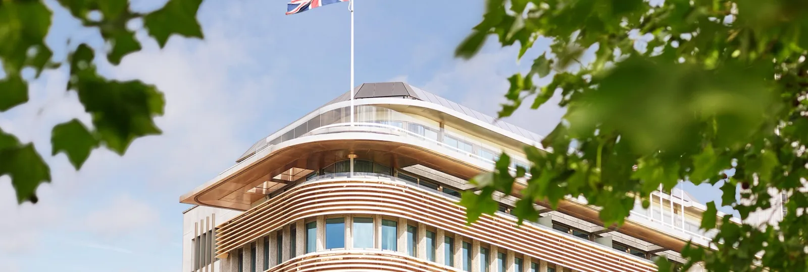 45 Park Lane-exterior daytime park-flag-highres