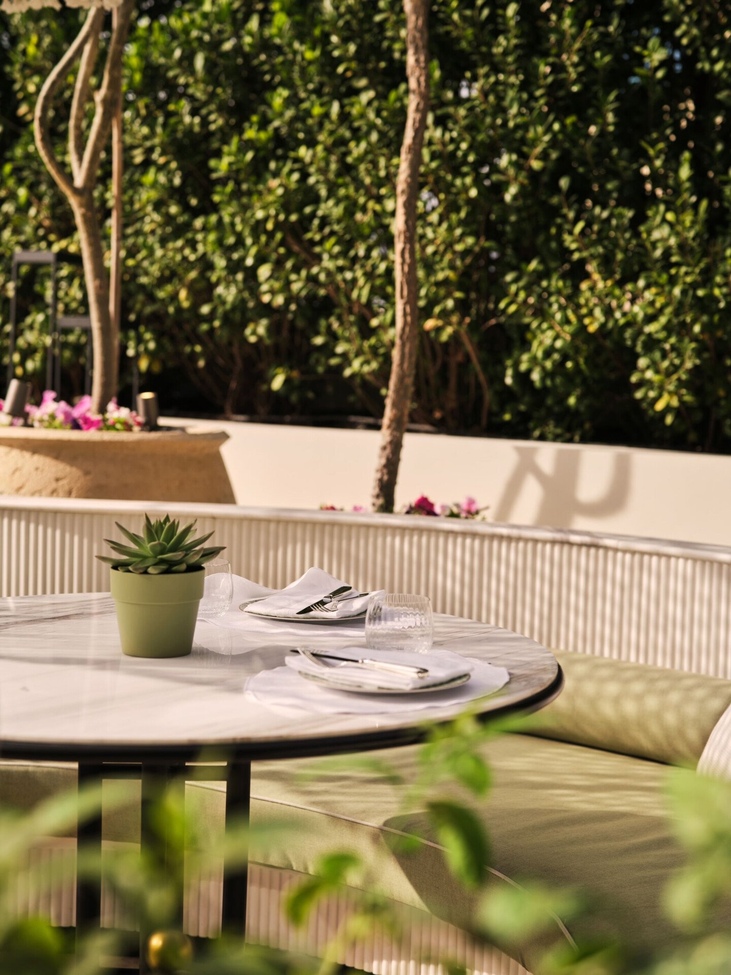 Image of Veranda design and food at The Lana - Dorchester Collection