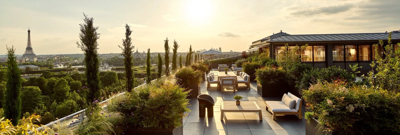 Belle Etoile suite terrace with sunset view of Eiffel Tower, at Le Meurice, Paris.