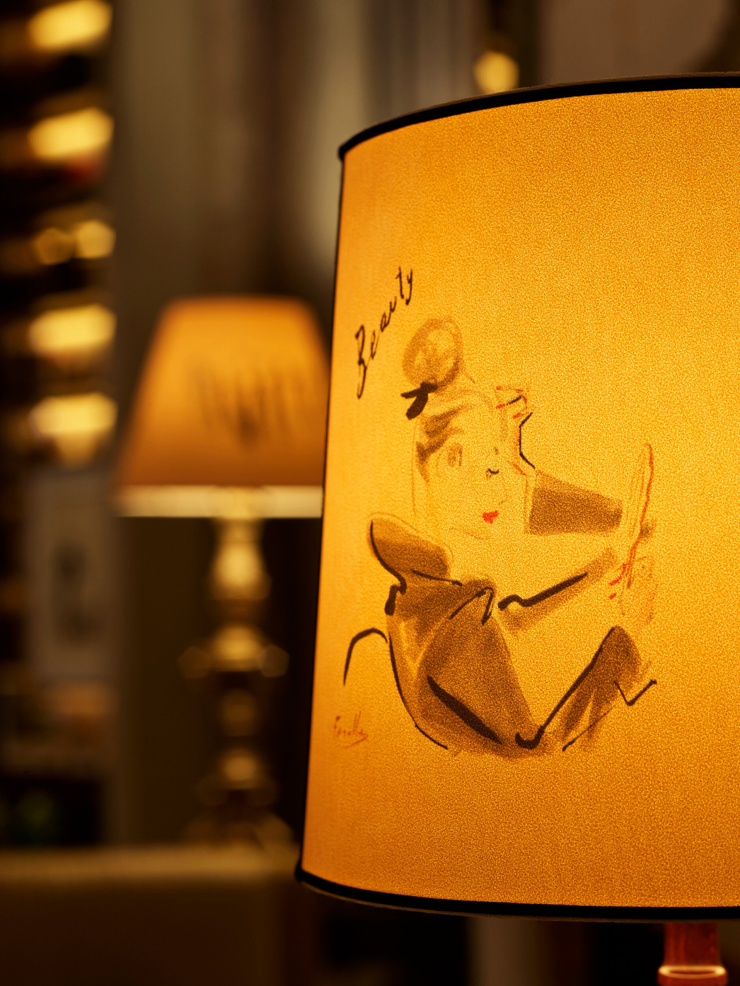 Lampshade with illustrations by Italian fashion illustrator Andrea Ferolla at La Libreria at Hotel Eden, Rome