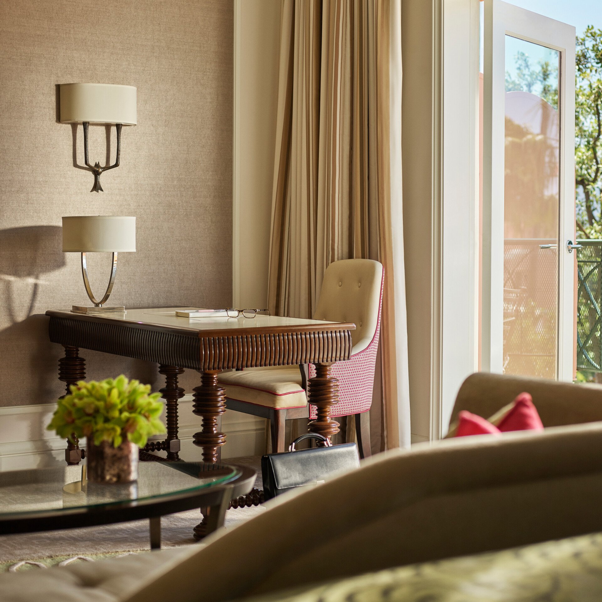 Comfortable work space with oversized desk in Deluxe Guestroom with Balcony