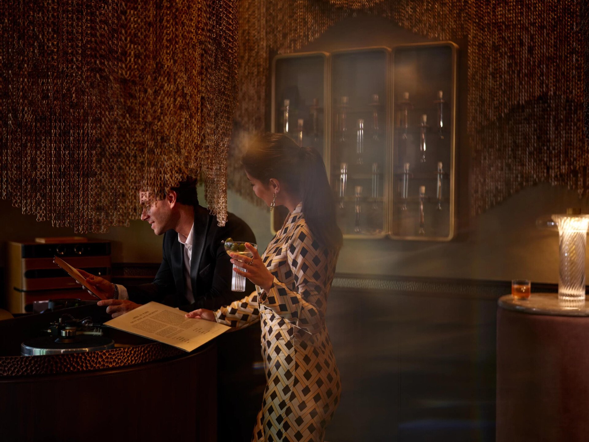 A couple enjoying drinks at Txakolina