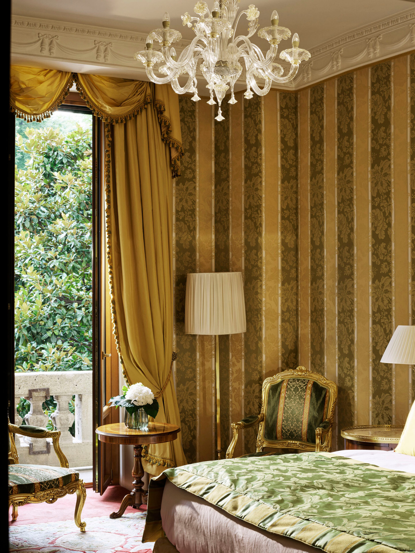 Royal Suite Bedroom Detail of the yellow and green wallpaper matching with the bed decorations