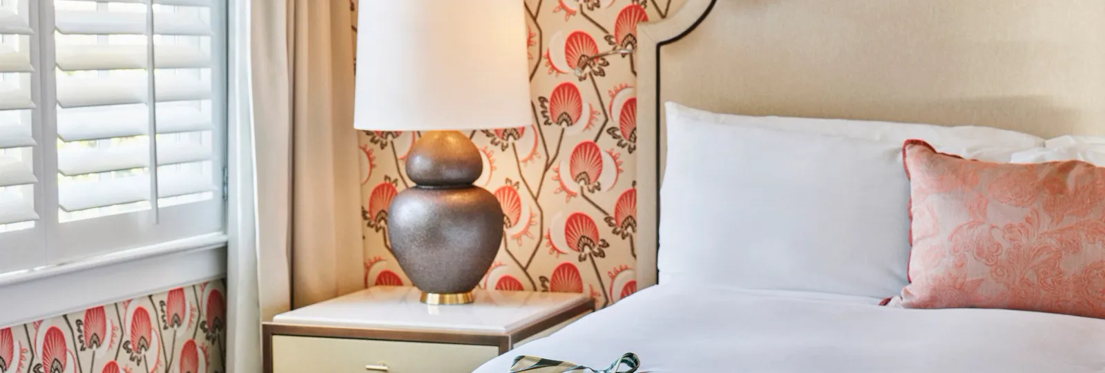 Bungalow Room with Patio Bedroom with Swimsuit and Glasses on Bed