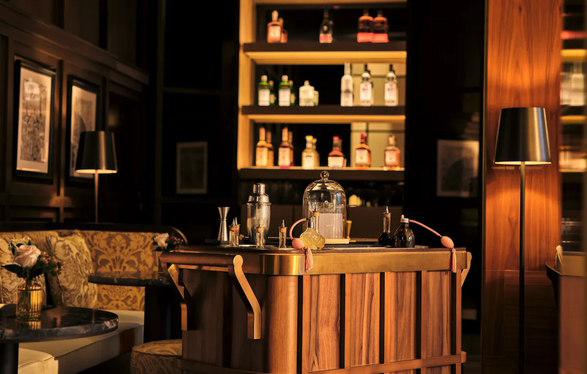 Bitter Honey bar interior with wooden drinks trolley at The Lana, Dubai