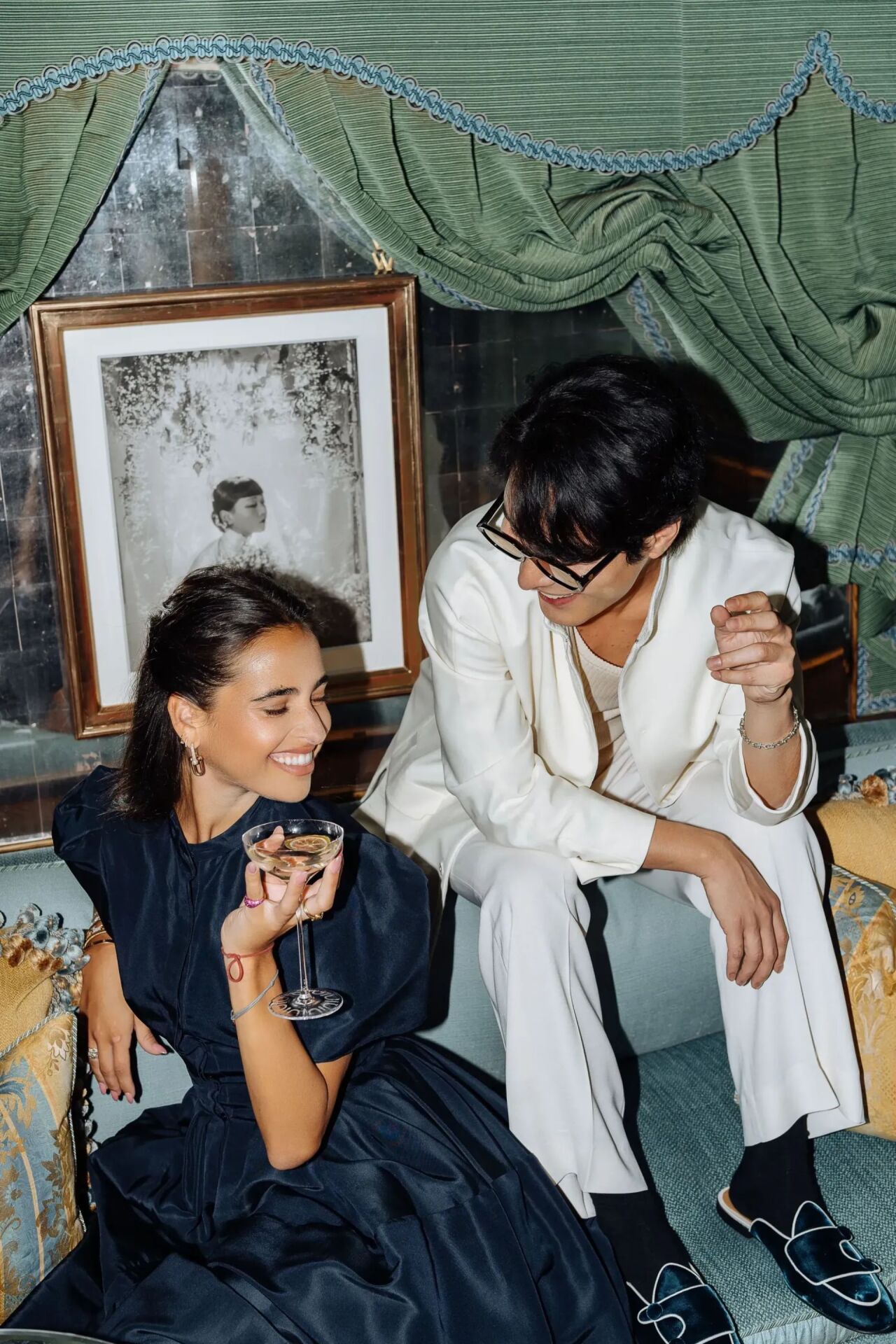 Party Photography at Vesper Bar at The Dorchester, people sitting drinking in the glamorous light of Vesper bar with Cocktail Bartenders creating stunning drinks