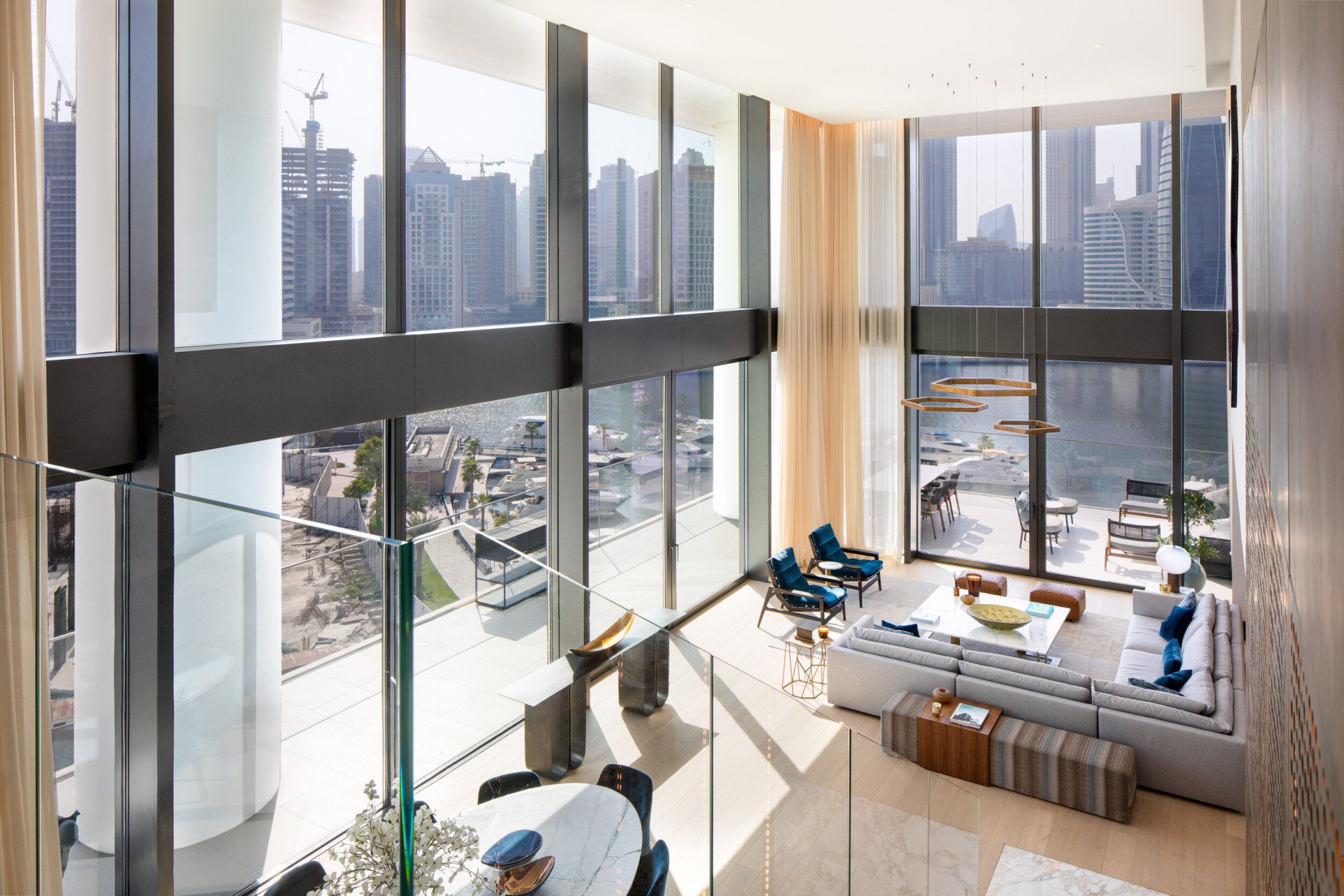 View from top of stairs in duplex apartment in The Residences Dubai, Dorchester Collection