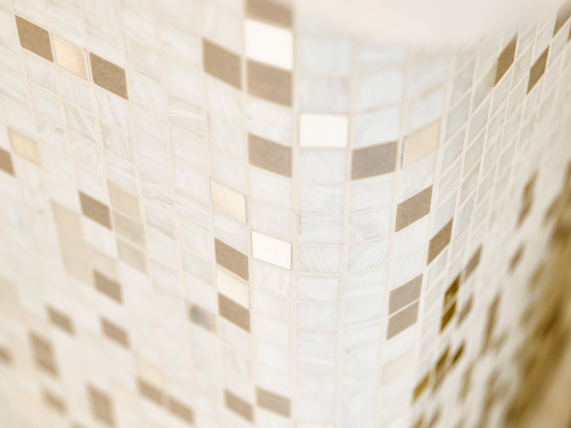 Detail of white marble tiles inside bathroom of Aurora Terrace Suite at Hotel Eden, Rome