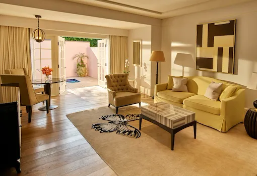 Living room leads to patio with private plunge pool at Hotel Bel-Air