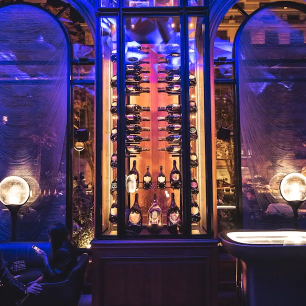 Le Bar's unique Dom Pérignon Cellar illuminated and the draped ceiling, at Hotel Plaza Athénée, Paris