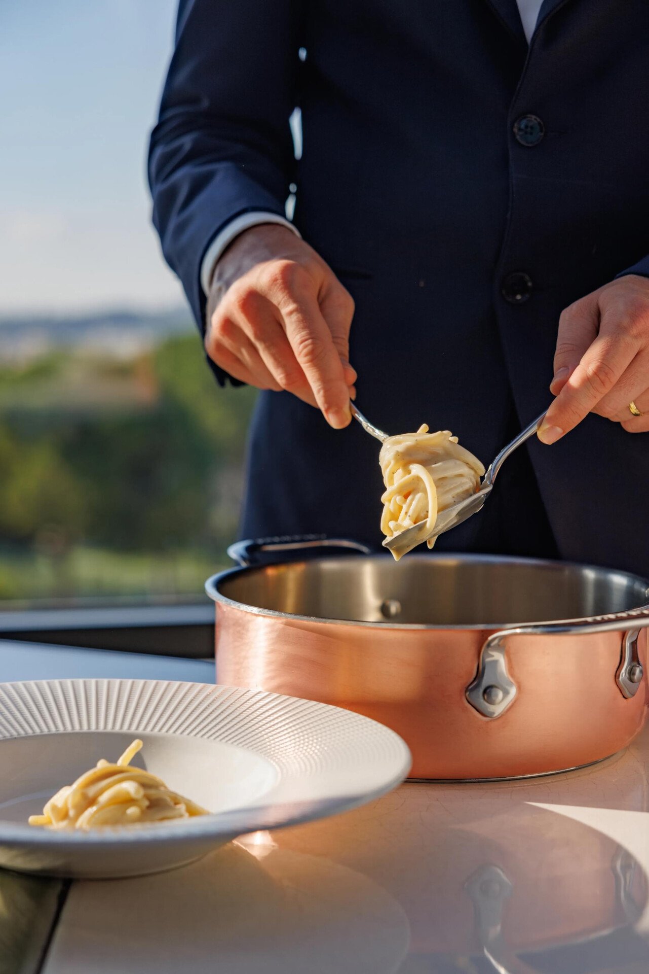 Cacio e pepe served at the table at Il Giardino Ristorante